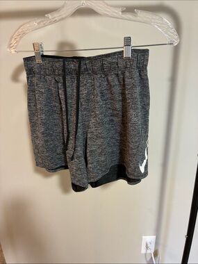 Nike Gray Athletic Shorts with White Swoosh